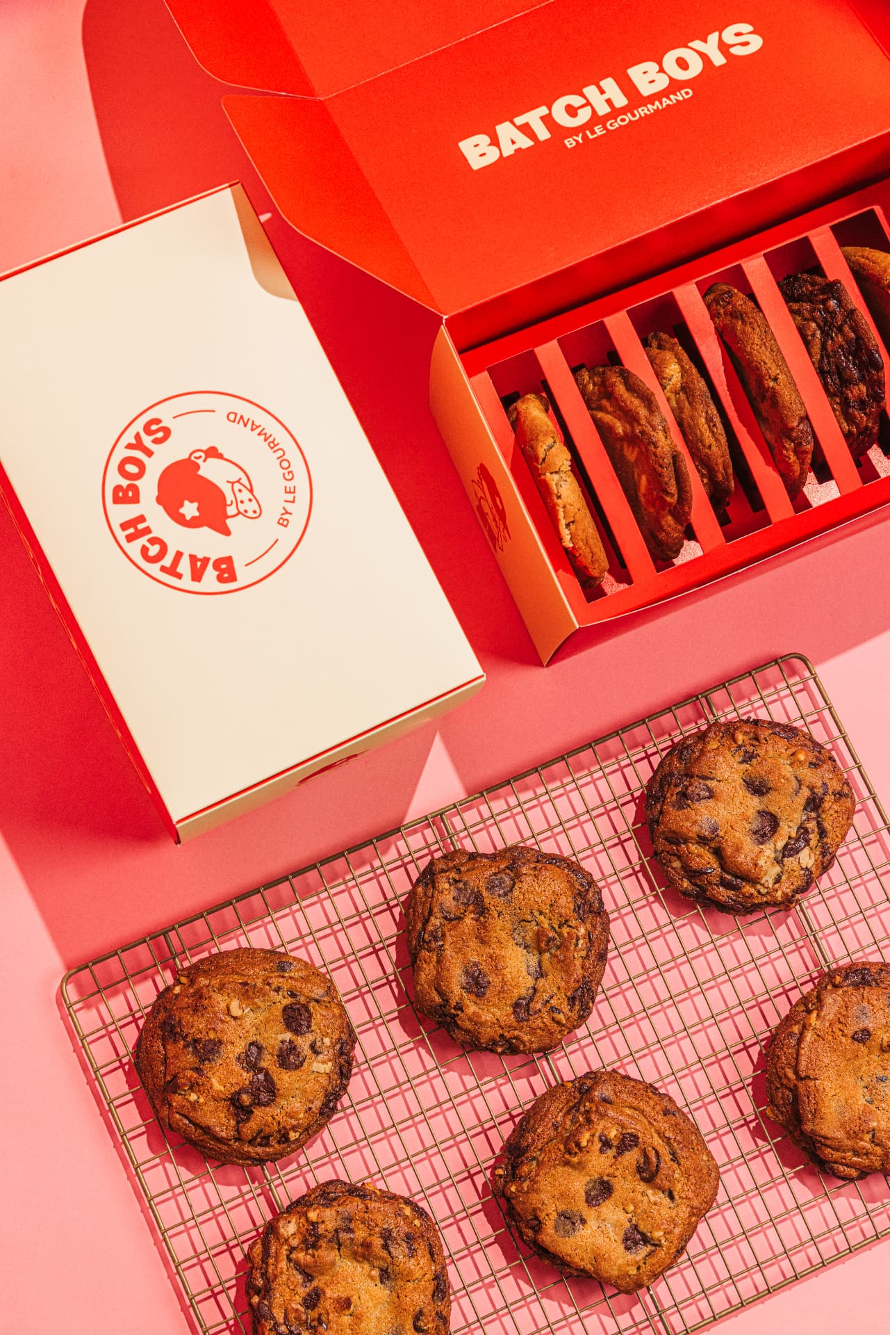 Open Batch Boys cookie box with a divided tray of cookies